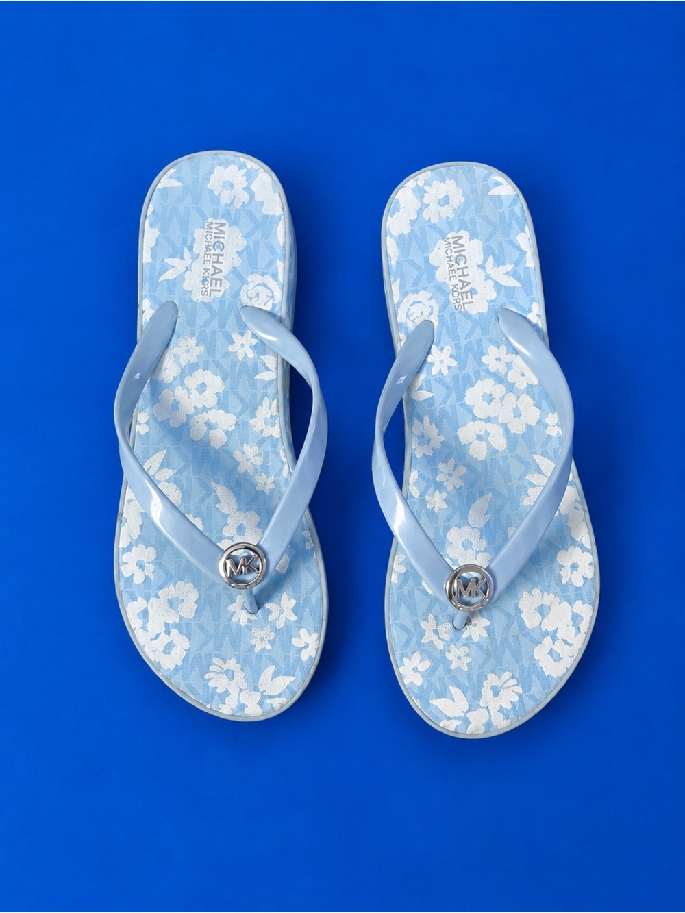 Michael Kors Pale Blue Floral Jelly Flip Flops